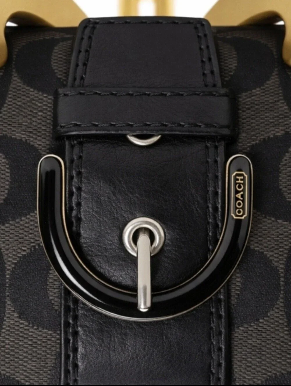 COACH Leather Signature Zip Wallet with Buckle Accent.